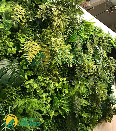 Experience the beauty of an indoor garden with artificial plant walls: the ultimate solution for all your decorating needs!