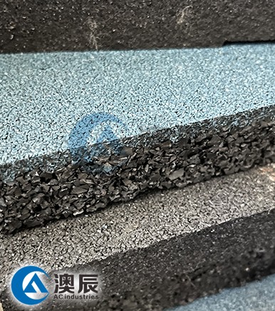 How does rubber floor tile improve the safety and comfort of the place?